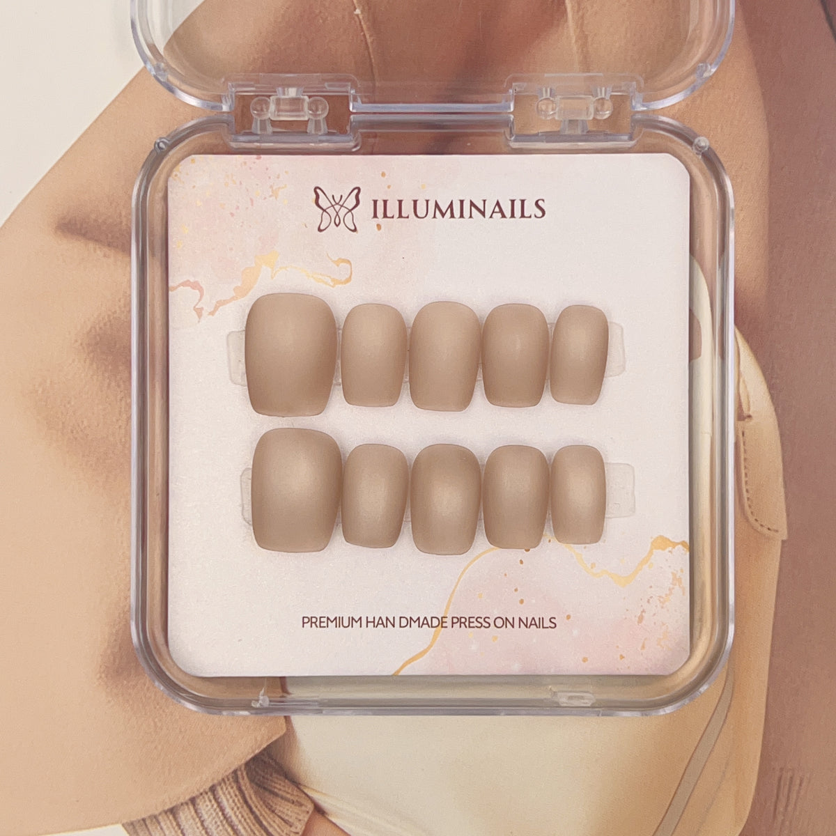 Rosy Pink matte cat-eye press-on nails in a short square shape