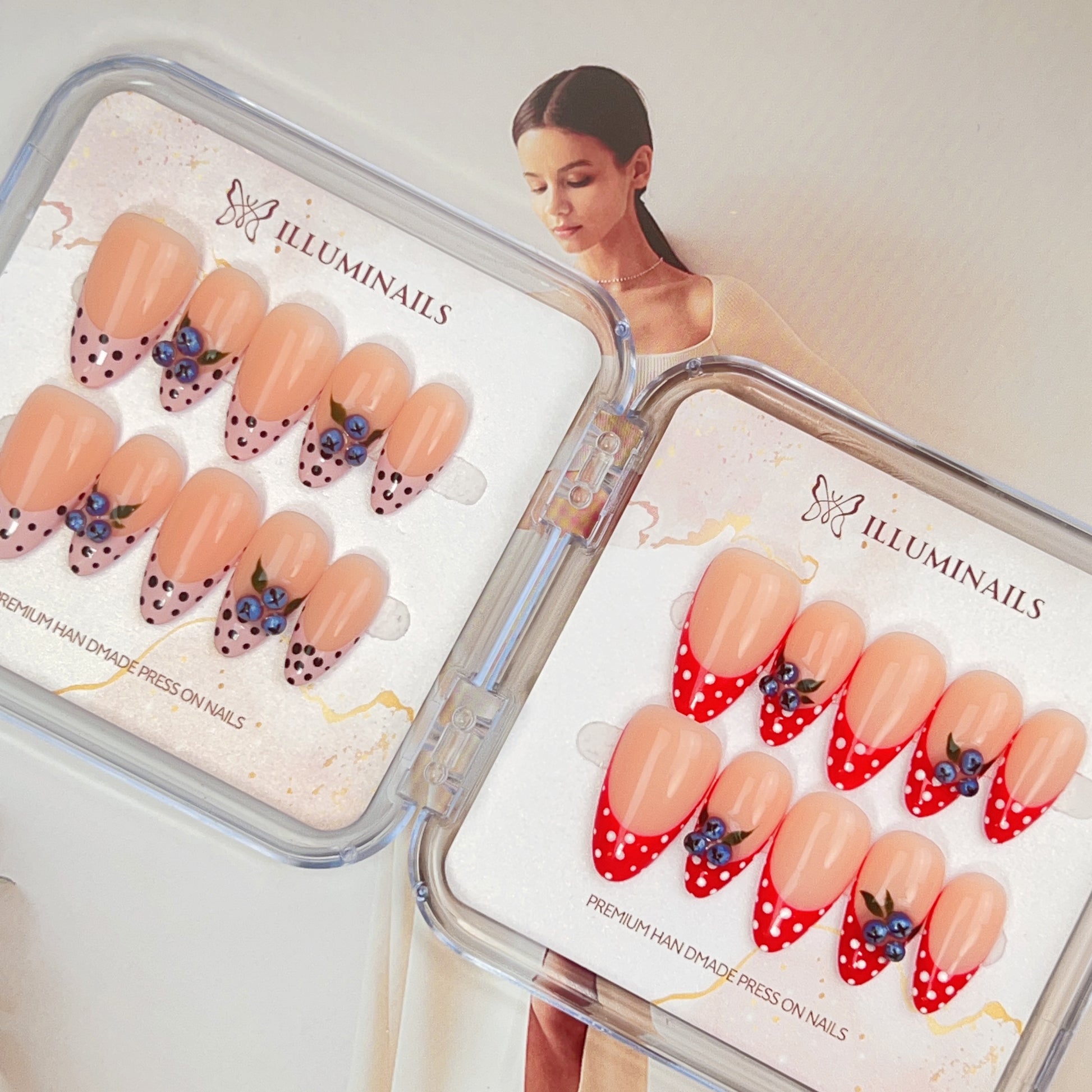 Blueberry Kiss French press-on nails with hand-painted blueberry details, polka dot French tips and soft nude base