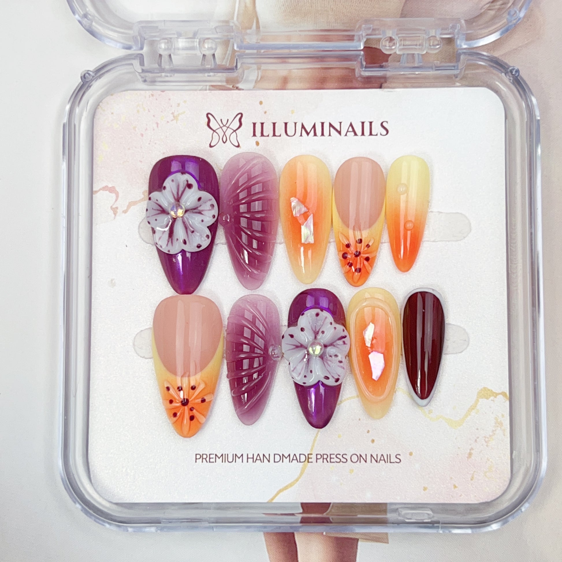 Mystic Bloom handmade floral press-on nails with orchid purple tones, sunset gradients and 3D flower details