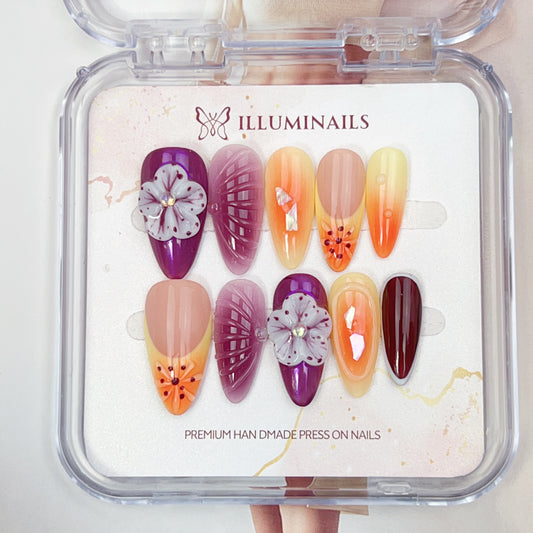 Mystic Bloom handmade floral press-on nails with orchid purple tones, sunset gradients and 3D flower details
