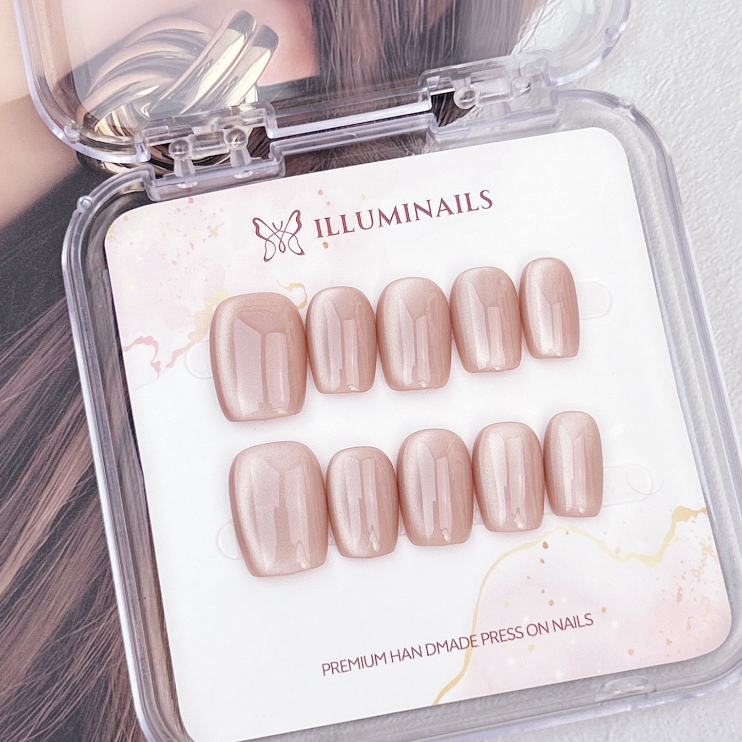 Cashmere Taupe cat eye press-on nails in a short square shape