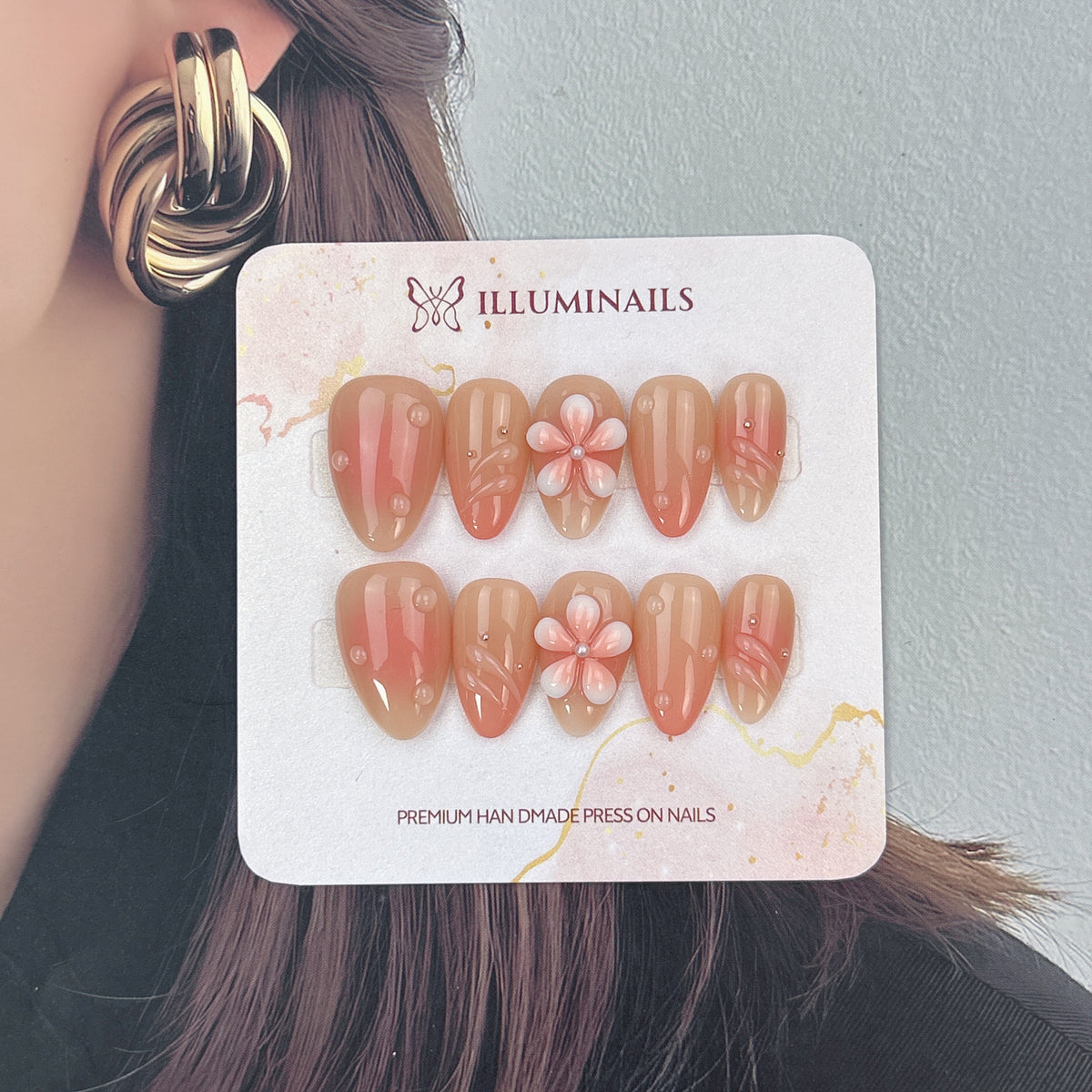 Apricot Grace glossy apricot nails with raised swirl details