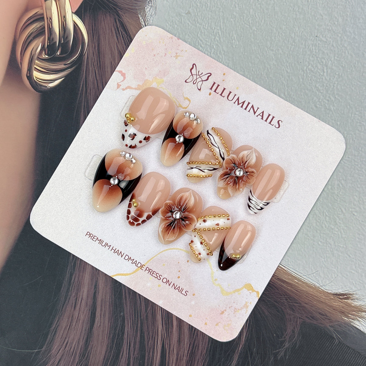 Mocha Muse nude and brown press-on nails with hand-painted gold details