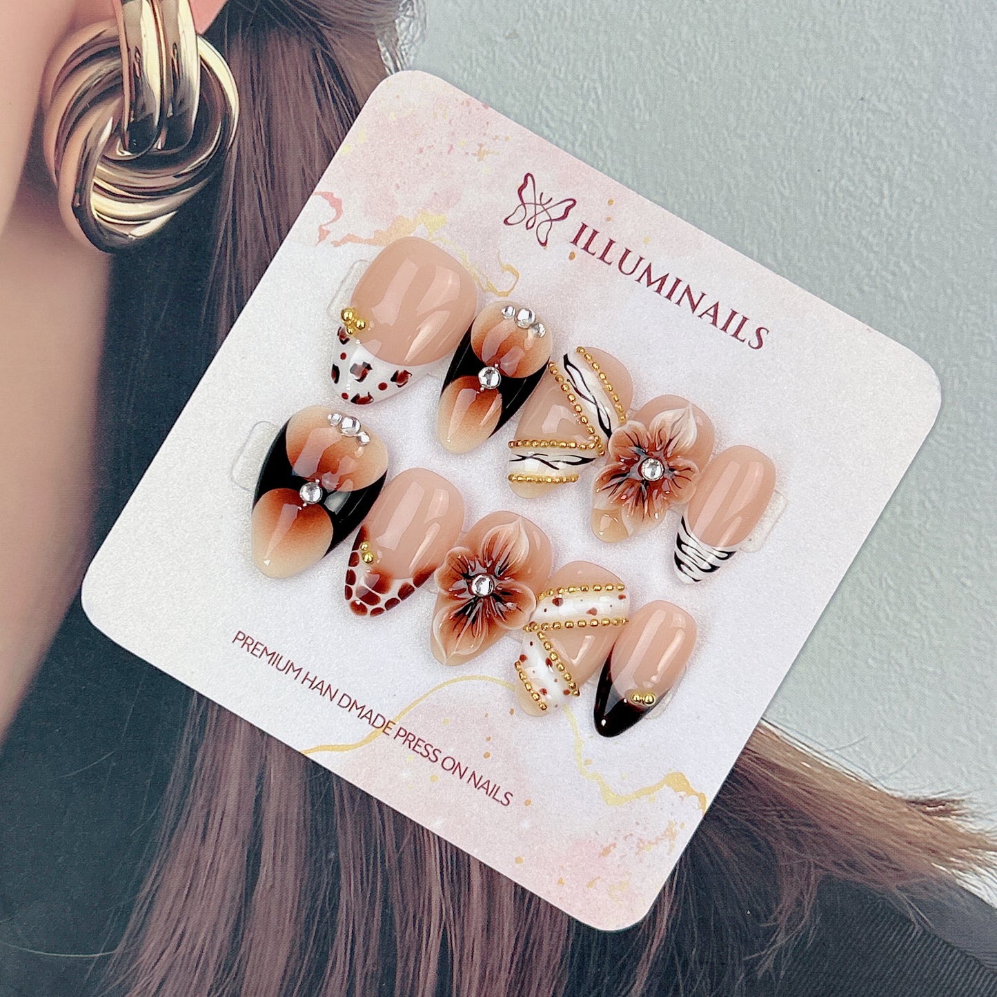 Mocha Muse mocha brown 3D floral press-on nails in short almond shape