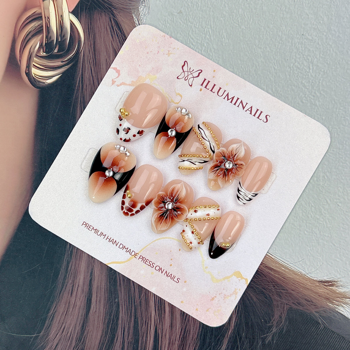 Mocha Muse mocha brown 3D floral press-on nails in short almond shape