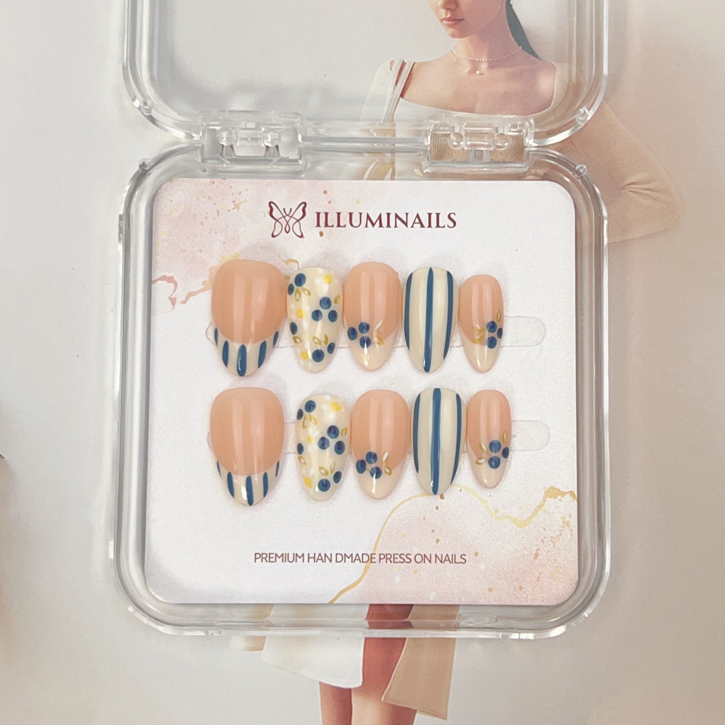 Blueberry Picnic hand-painted French press-on nails with blueberry motifs, blue stripes and soft nude tones
