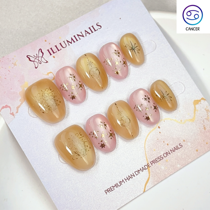 Cancer zodiac cat eye press-on nails in golden amber and blush, Extra Short Oval