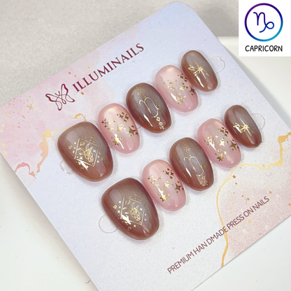 Capricorn zodiac cat eye press-on nails in taupe brown and blush, Extra Short Oval