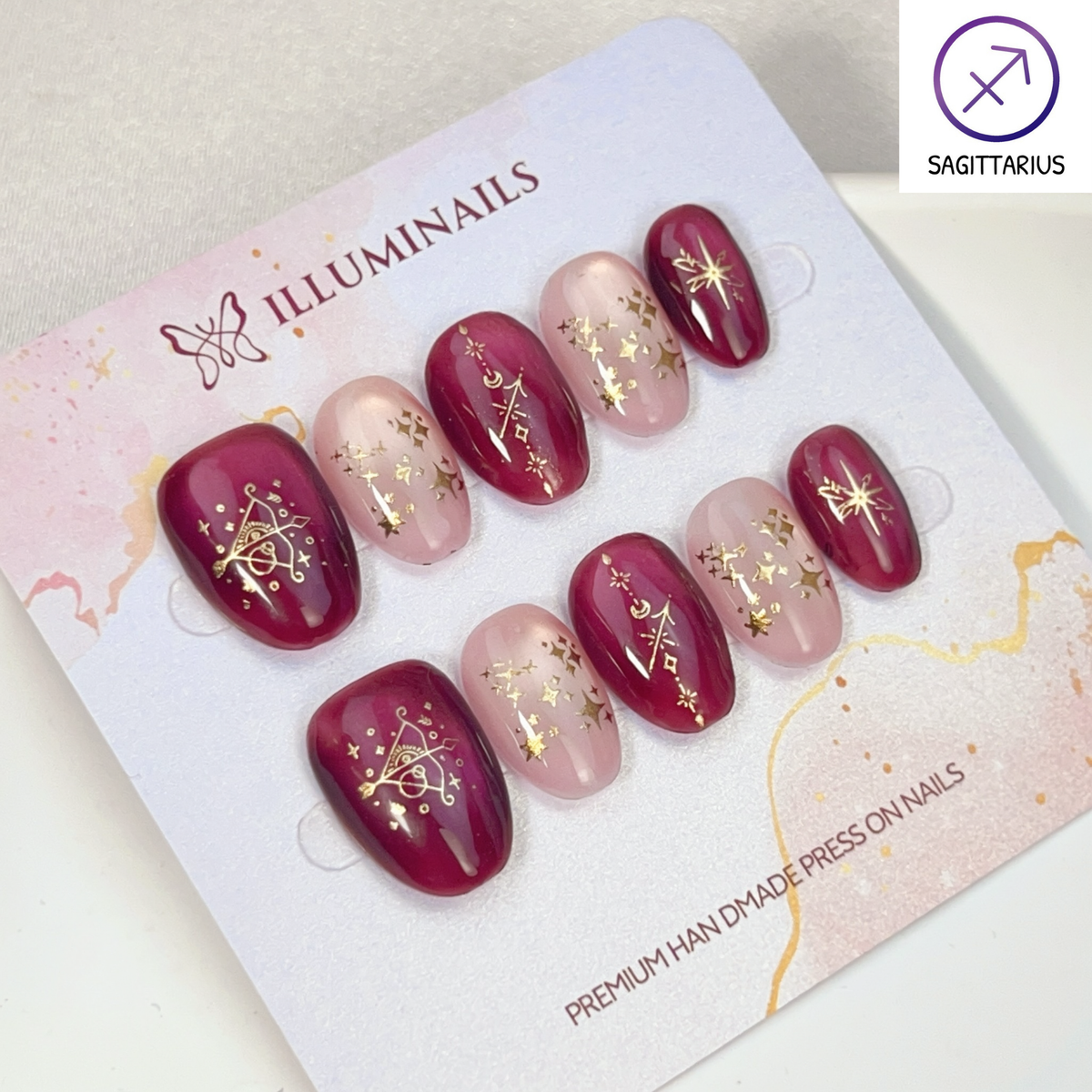 Sagittarius zodiac cat eye press-on nails in burgundy and blush, Extra Short Oval