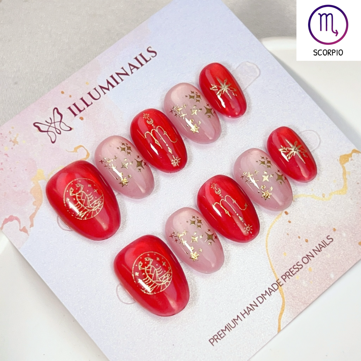 Scorpio zodiac cat eye press-on nails in deep red and blush, Extra Short Oval