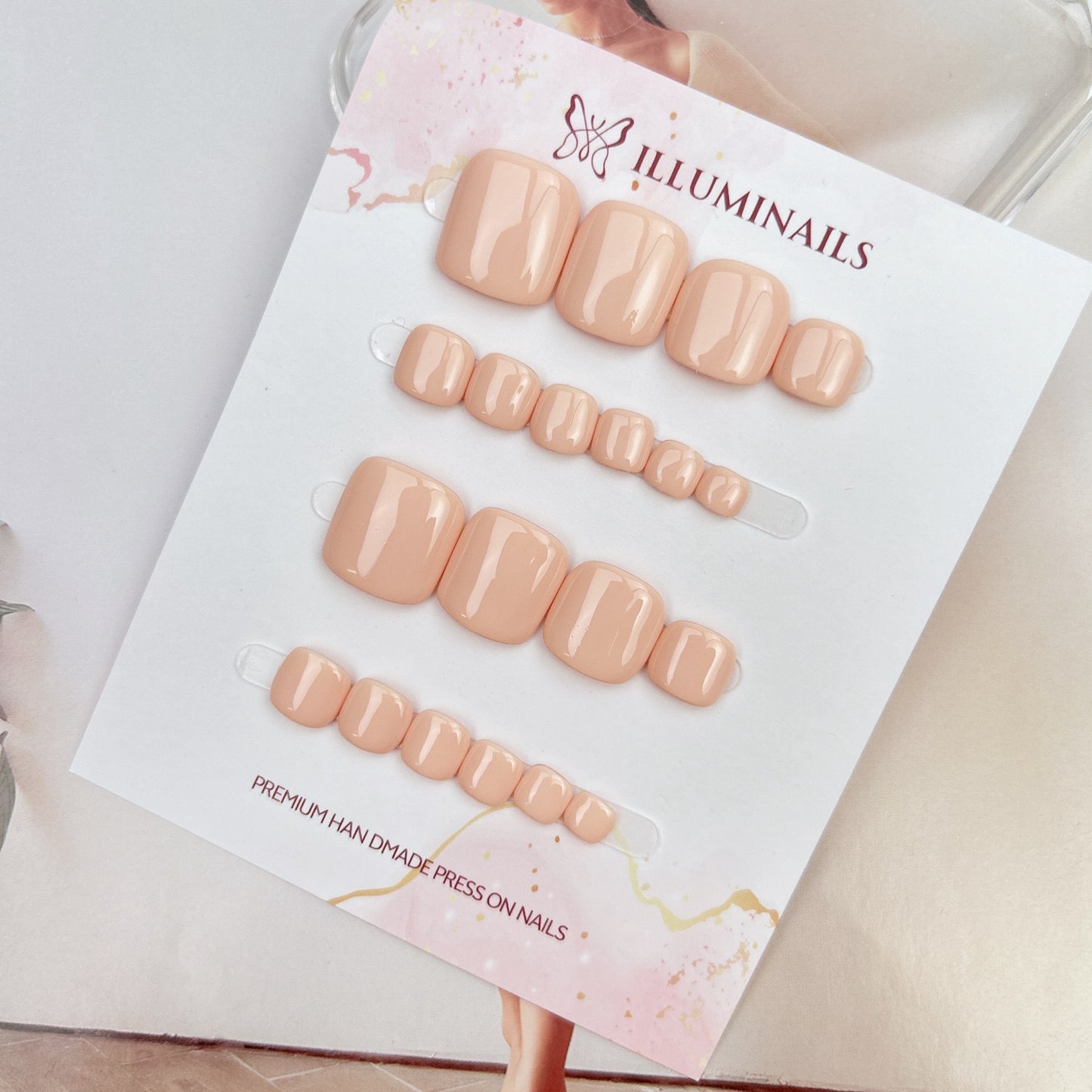Nude Pink solid press-on toenails from the Essential Pedi Collection