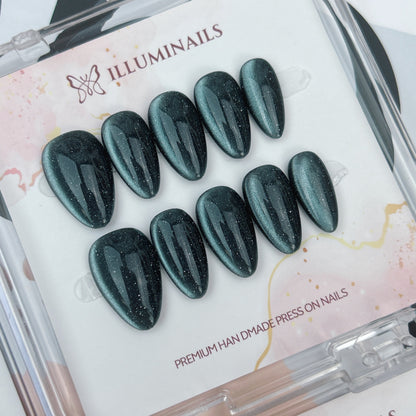 Forest Teal glitter cat eye press-on nails in short almond shape