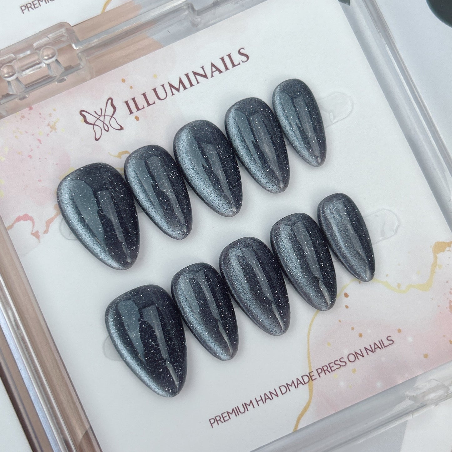 Moonlit Silver glitter cat eye press-on nails in short almond shape