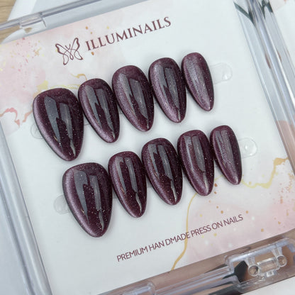 Mulberry Plum glitter cat eye press-on nails in short almond shape