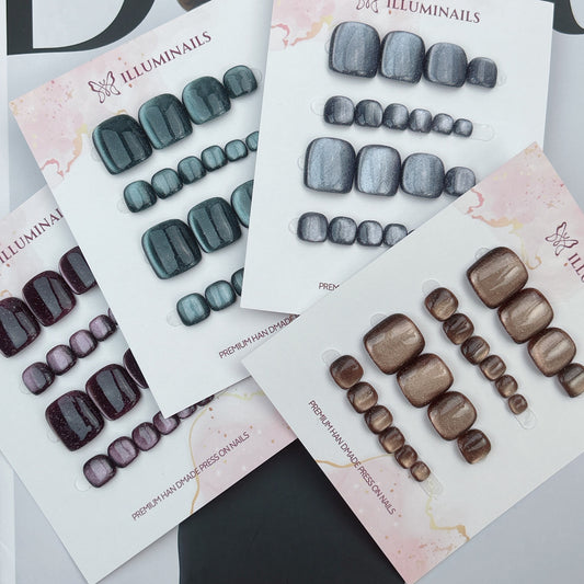 Midnight Stardust glitter cat-eye press-on toenails in four colours
