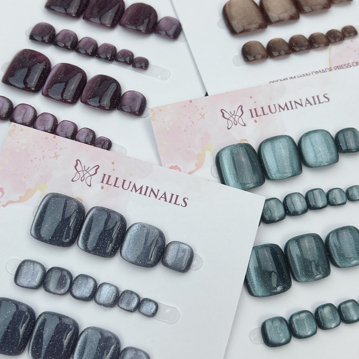 Four colour options in the Midnight Stardust press-on toenail collection