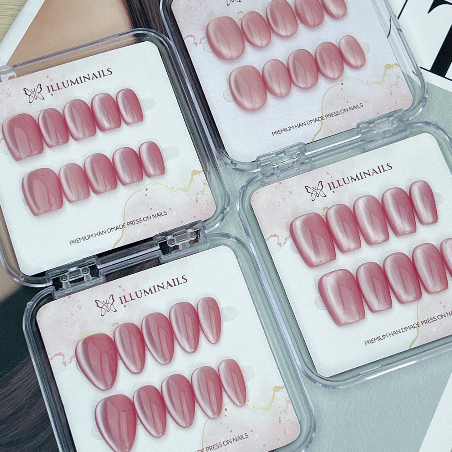Pink Lady rose pink cat eye press-on nails shown in four nail shapes