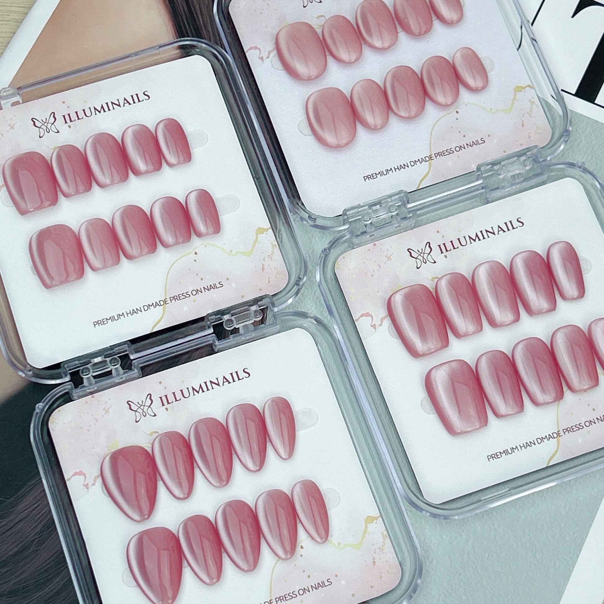 Pink Lady rose pink cat eye press-on nails shown in four nail shapes