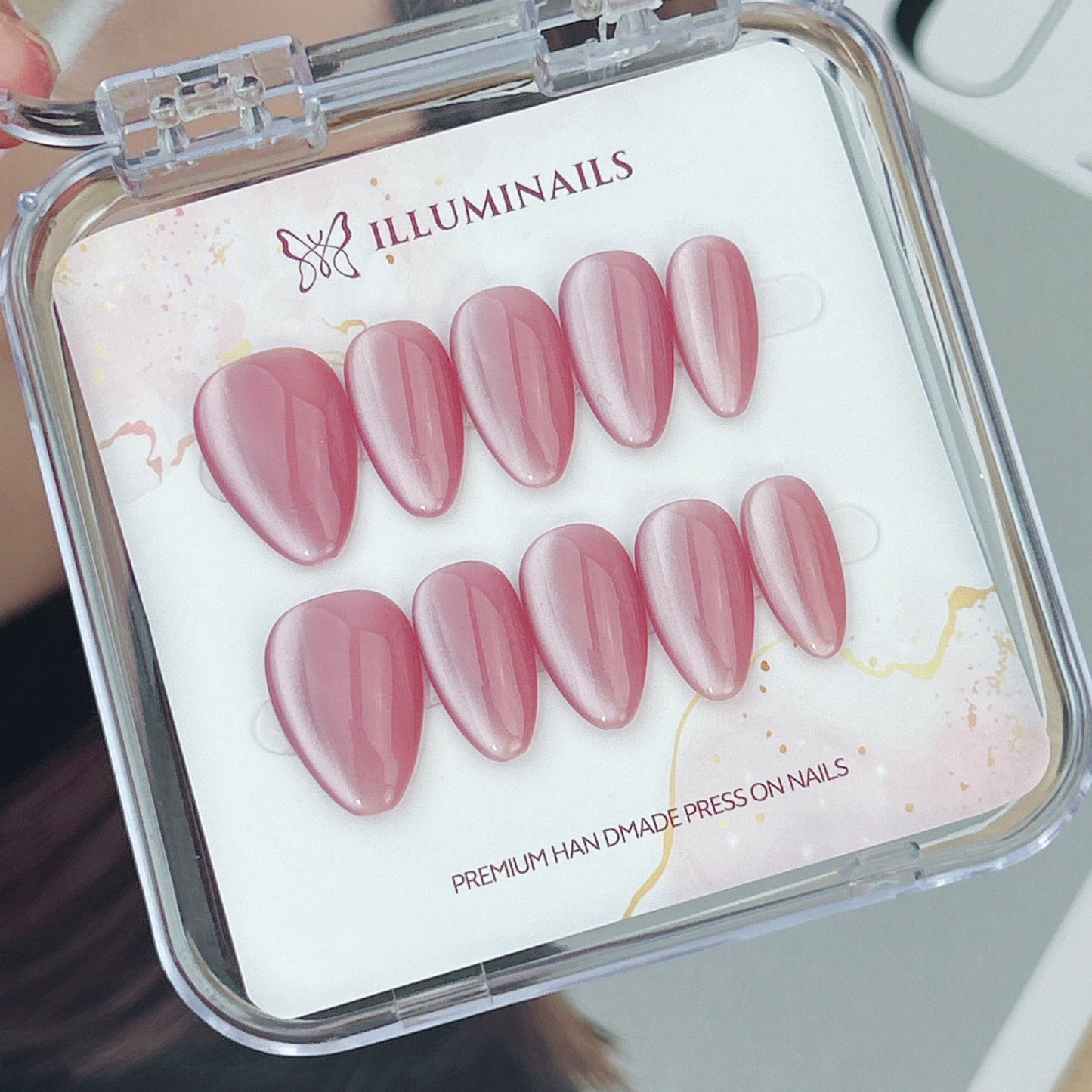 Pink Lady rose pink cat eye press-on nails in Short Almond shape